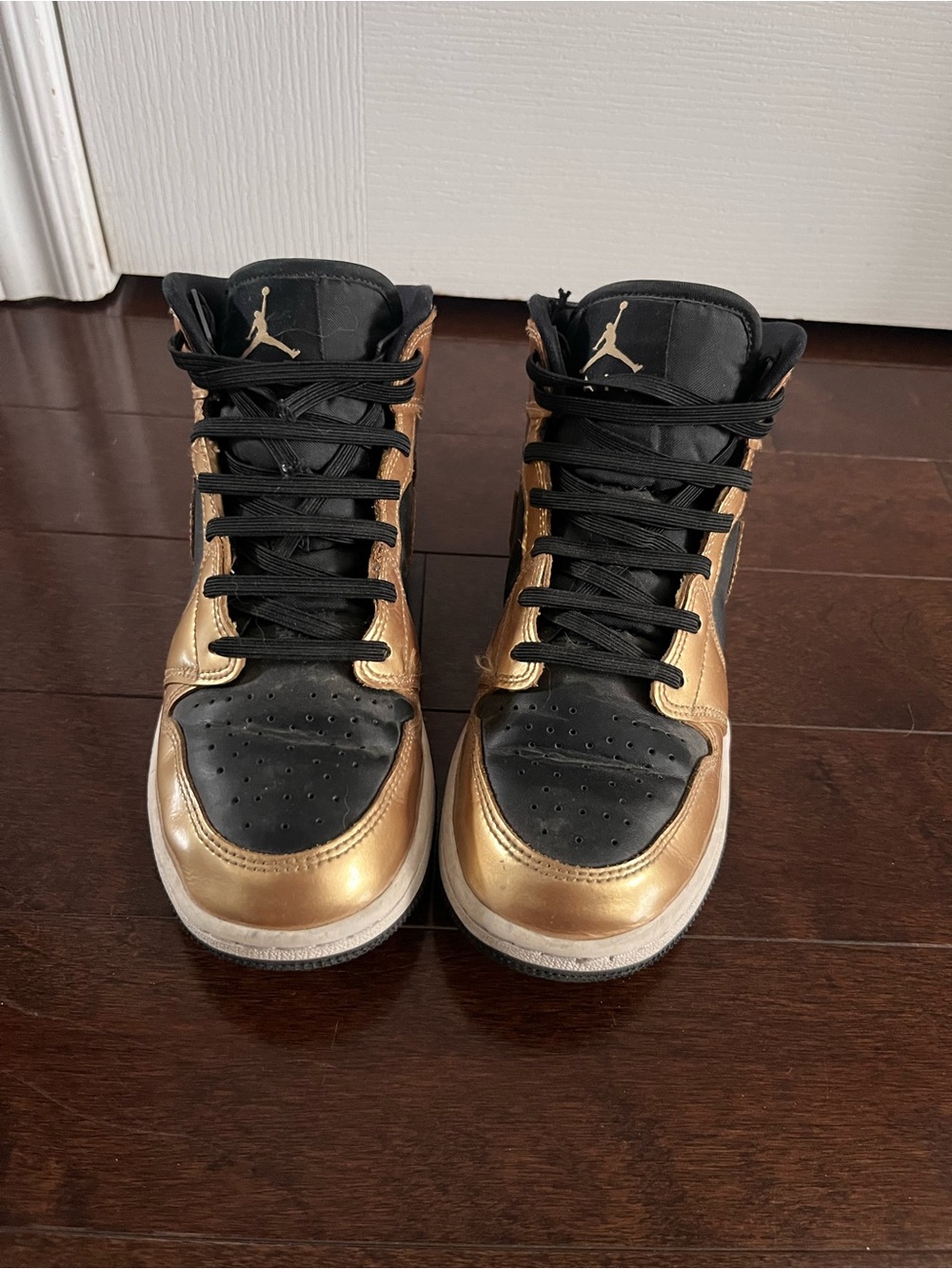 Jordan High Top Sneakers in Black and Metallic Gold